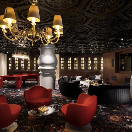 Hotel Mondrian Ad Dawhah Camera foto The lobby of the hotel