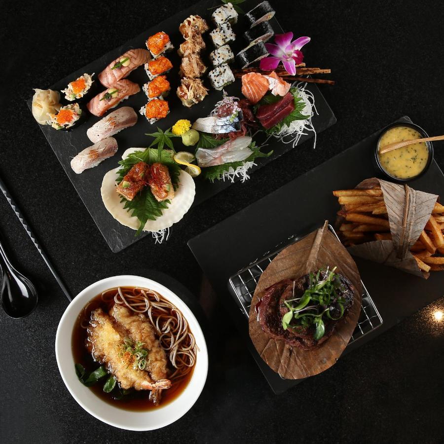 Hotel Mondrian Ad Dawhah Esterno foto A selection of dishes at the restaurant