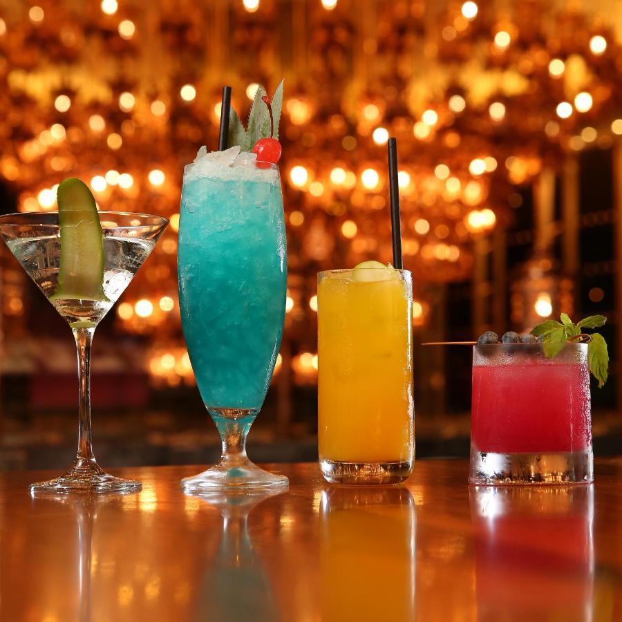 Hotel Mondrian Ad Dawhah Esterno foto A selection of cocktails