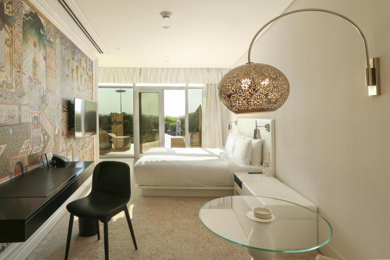 Hotel Mondrian Ad Dawhah Esterno foto A room at the hotel