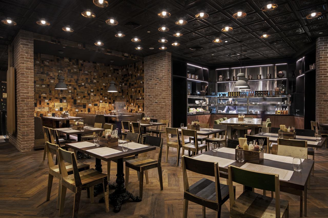 Hotel Mondrian Ad Dawhah Esterno foto Restaurant interior