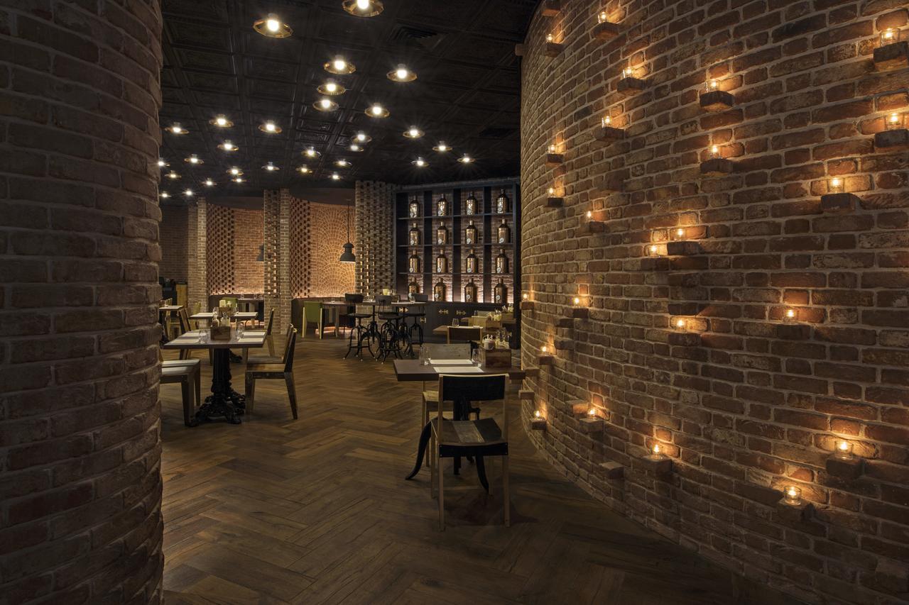 Hotel Mondrian Ad Dawhah Esterno foto Interior of the restaurant