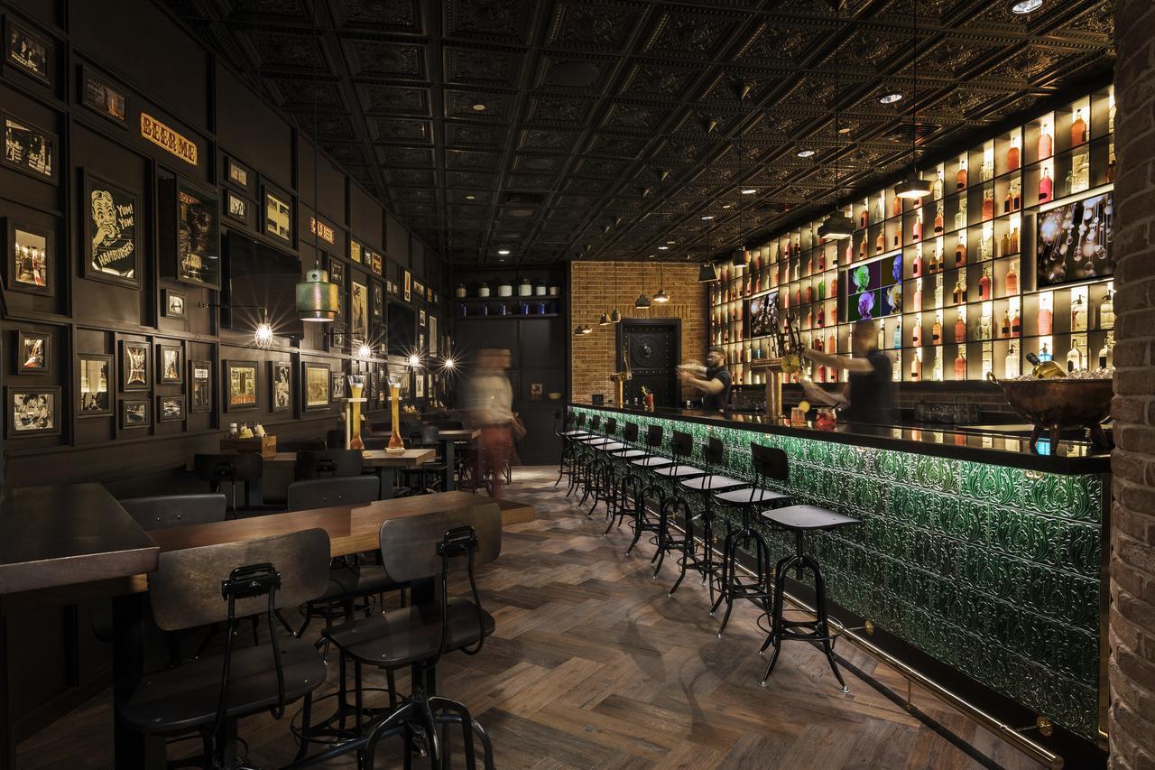Hotel Mondrian Ad Dawhah Esterno foto The interior of the bar
